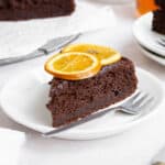 Slice of Chocolate Marmalade Cake on a plate with a fork