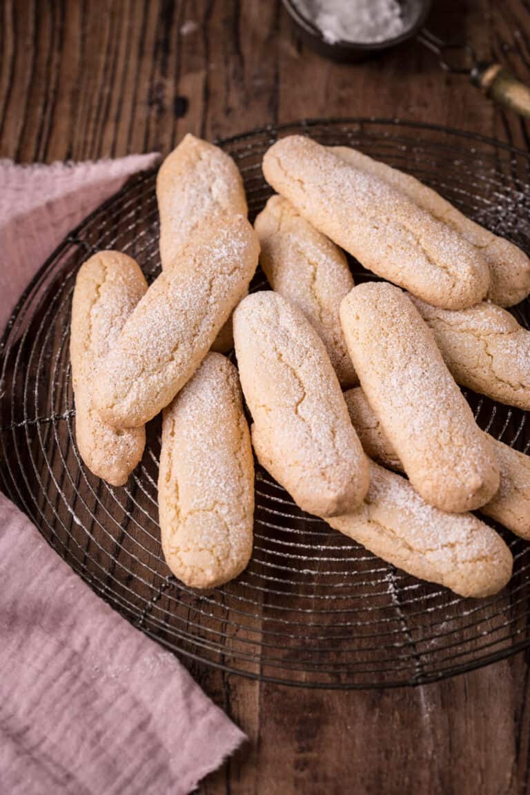 Ladyfingers on a wire rack.