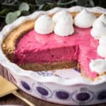 Cranberry Tart with slice cut out showing creamy filling.