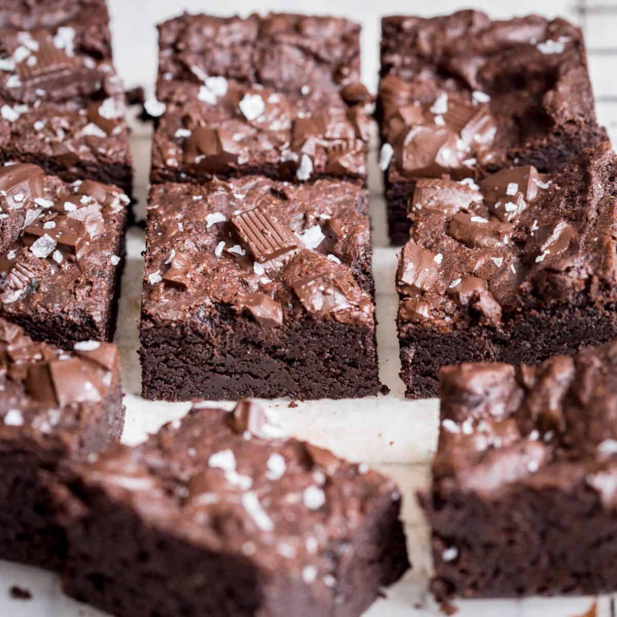 A batch of homemade gluten-free brownies cut into squares.
