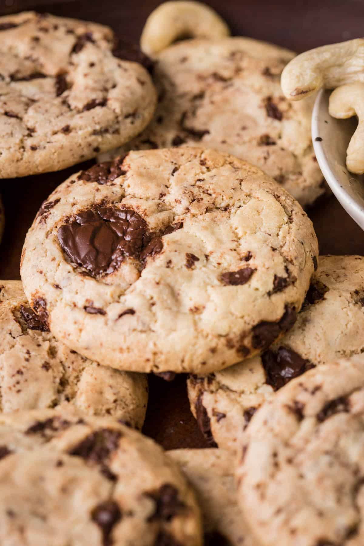 A Cashew Butter Cookie with molten chocolate puddles.