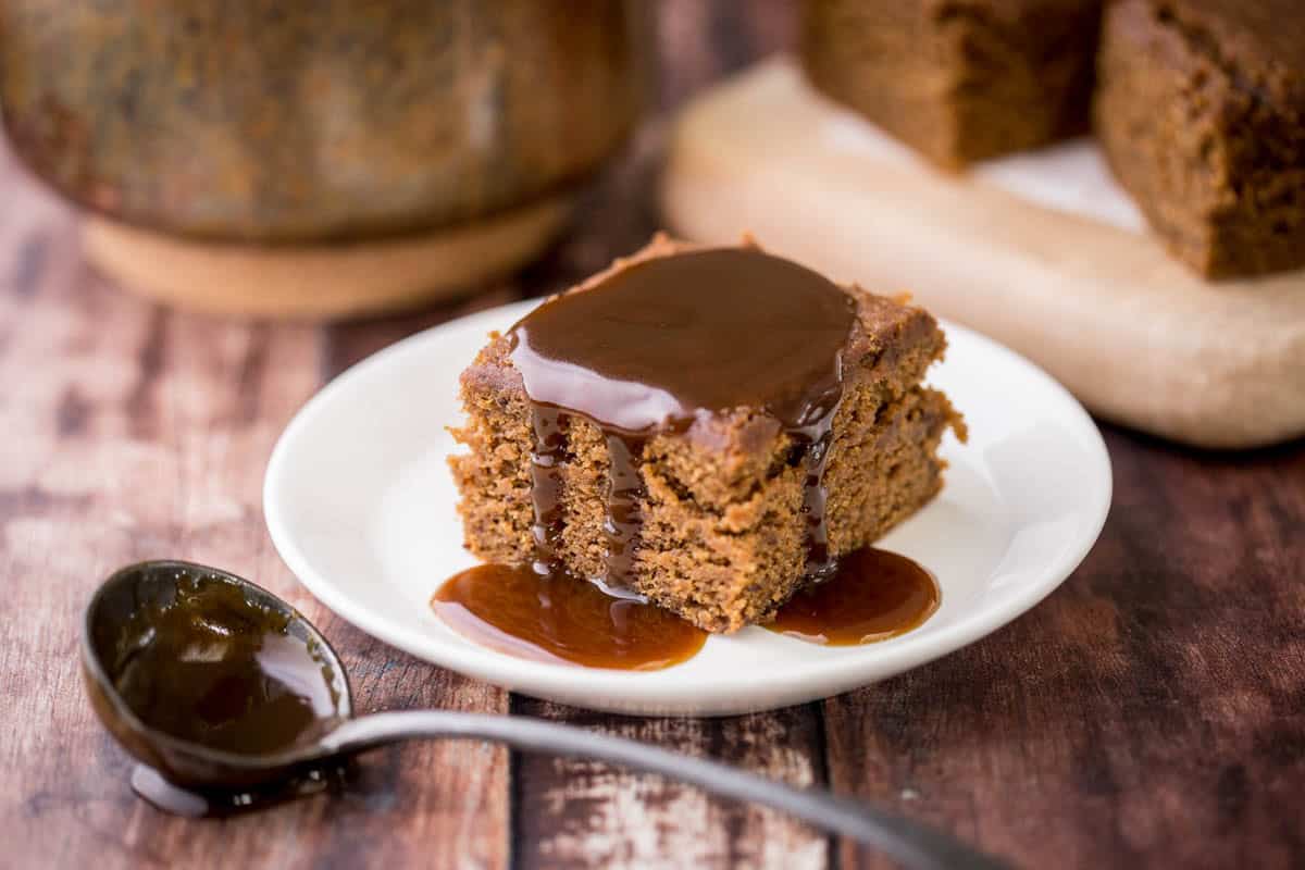 Sticky Toffee Sauce poured over Sticky Toffee Pudding.