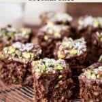 Pin image of Flourless Chocolate Pistachio Coconut Slice on a wire rack.