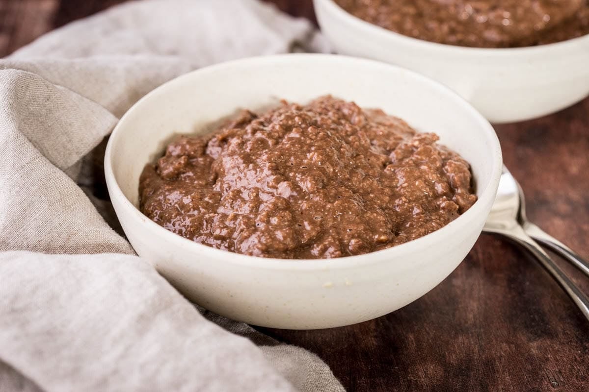 Chocolate Porridge in a bowl showing a very creamy consistency.