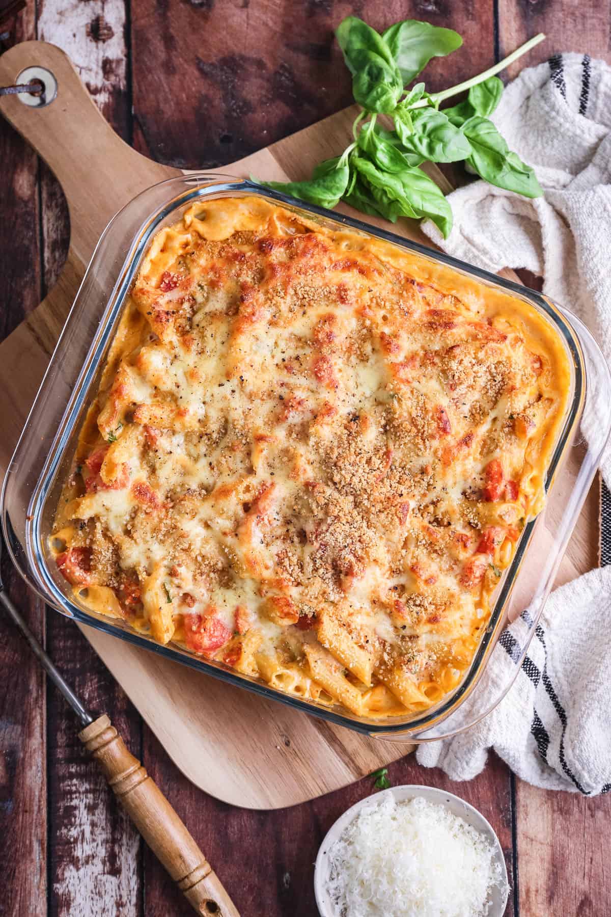 A serving dish of Gluten-Free Tuna Pasta Bake showing creamy cheesy crispy top.