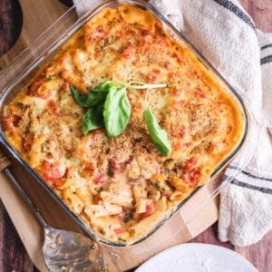 A serving dish of Gluten-Free Tuna Pasta Bake showing creamy cheesy crispy top.