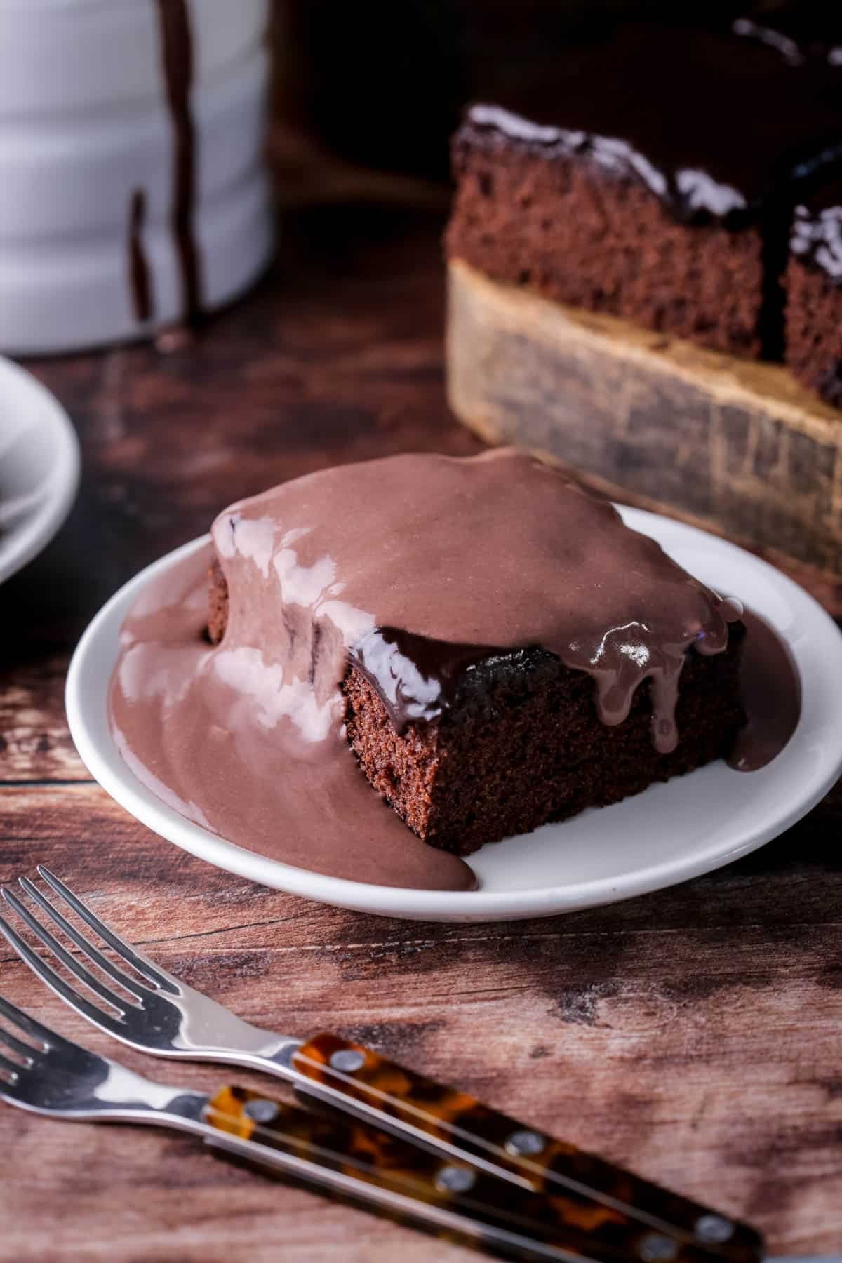Chocolate sponge cake covered in rich velvety smooth chocolate custard.