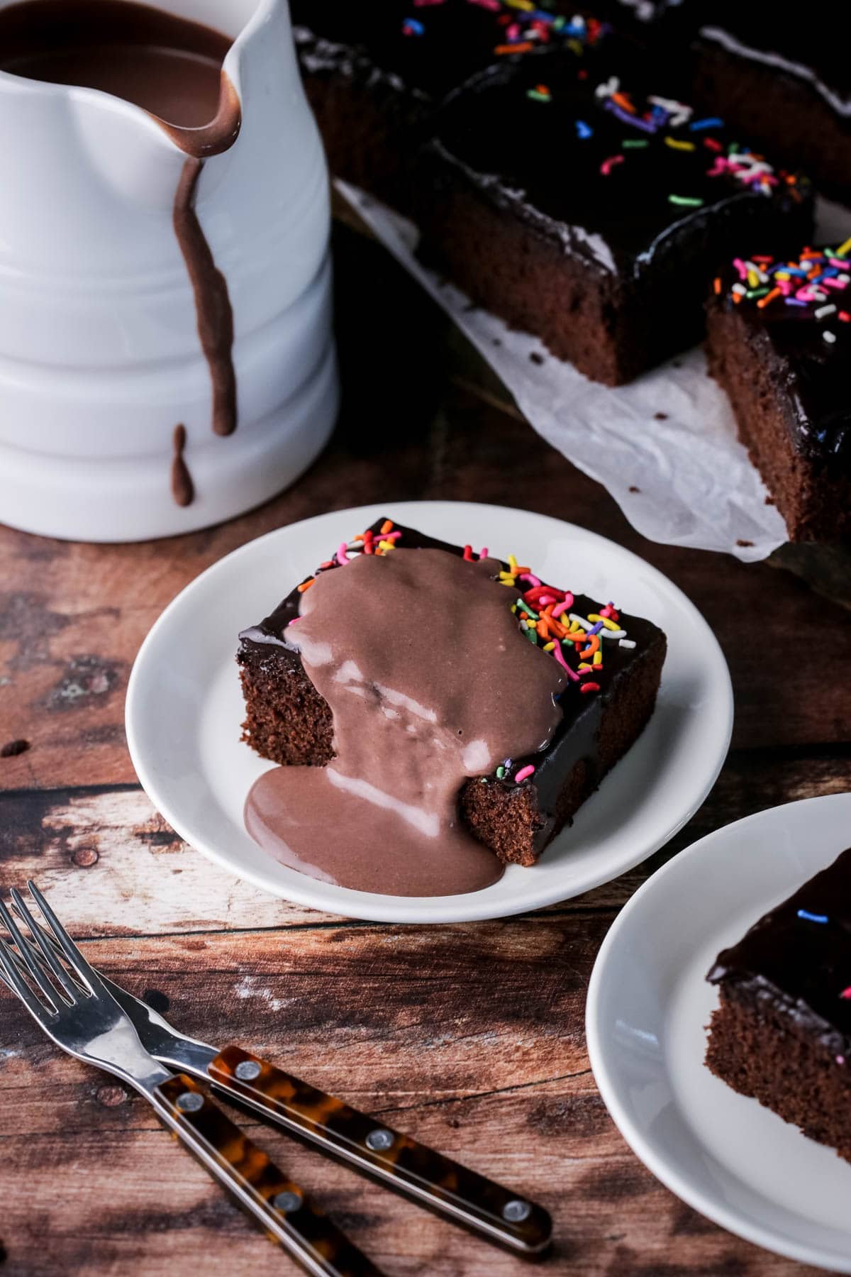 Chocolate sponge cake covered in rich velvety smooth chocolate custard.