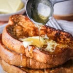 Gluten-Free French Toast with melted butter and honey poured over the top.