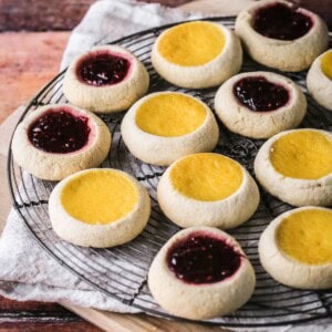 Gluten-Free Thumbprint Cookies on a cooling rack.