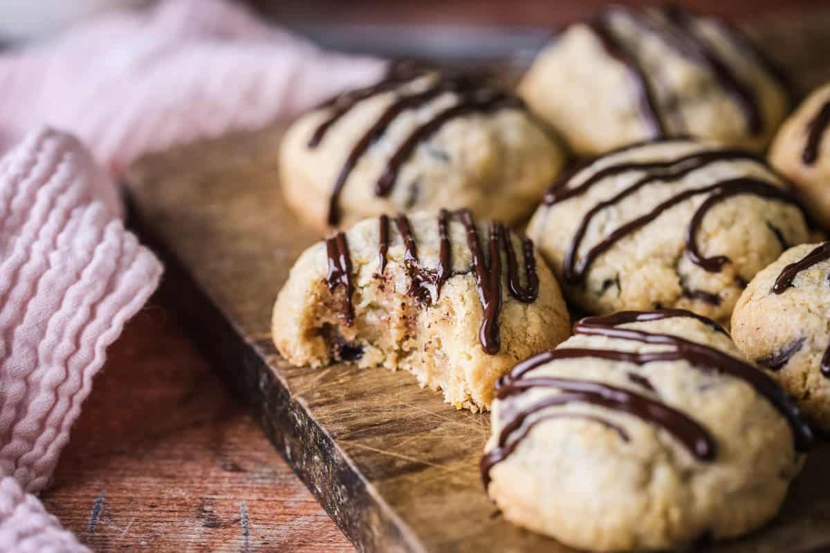 Bite taken out of Easter Cookie showing soft slightly chewy centre packed with fillings.