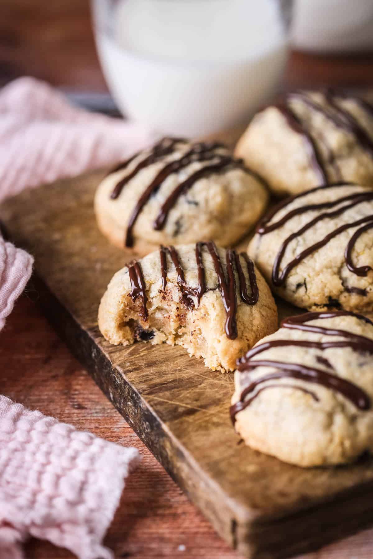 Bite taken out of Easter Cookie showing soft slightly chewy centre packed with fillings.