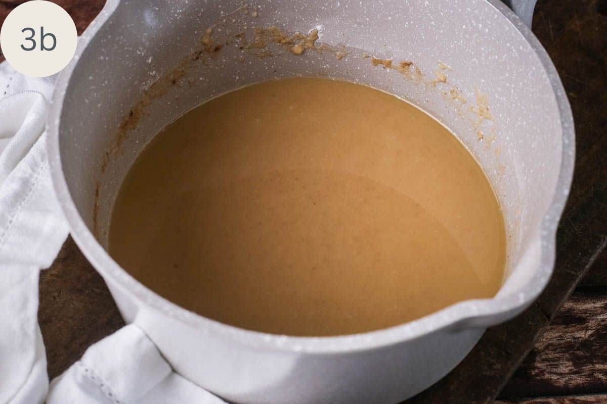 Brown roux with a darker toastier colour made with cassava flour and butter in a saucepan.