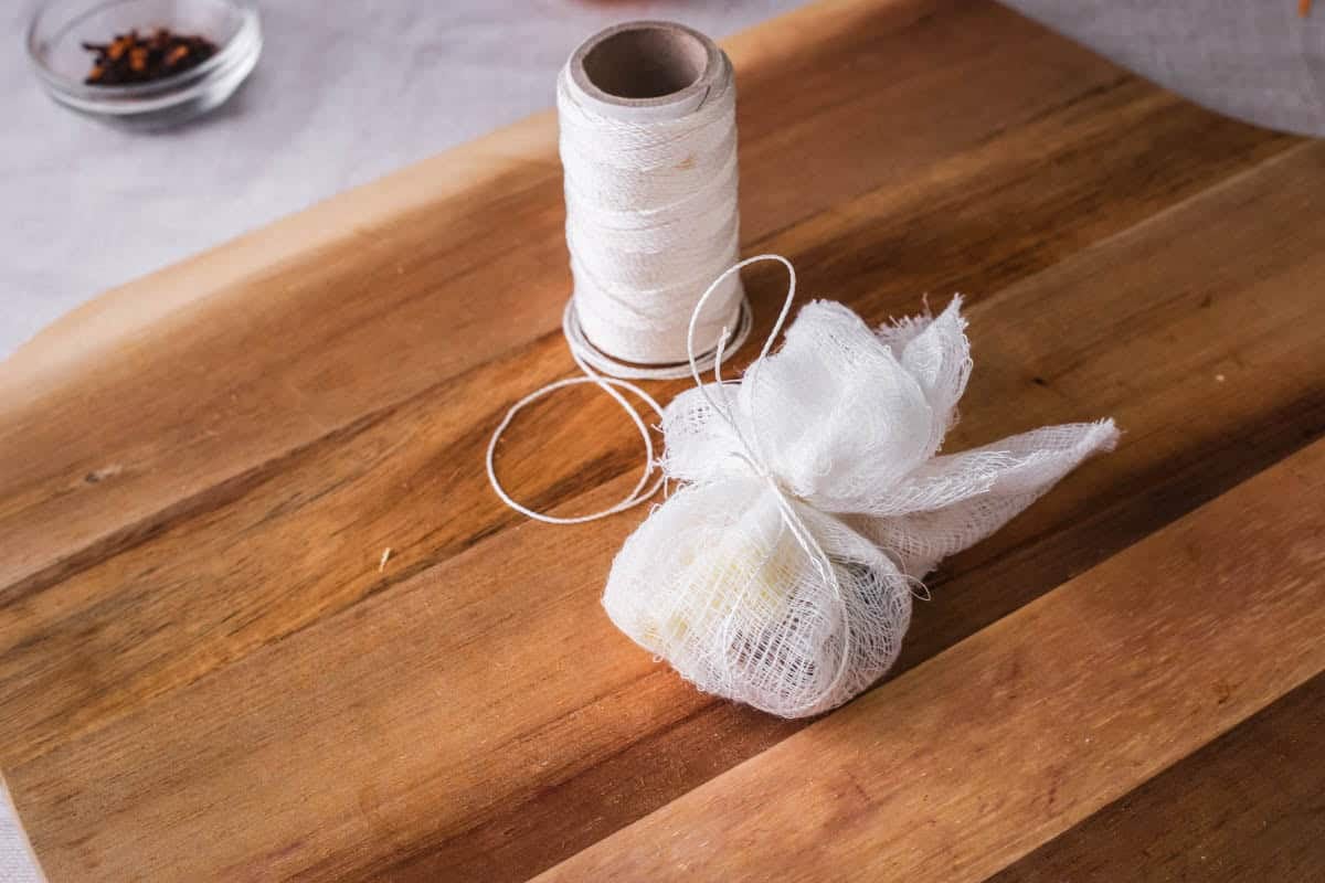 kitchen string and a muslin bag full of aromatics for chutneuy.