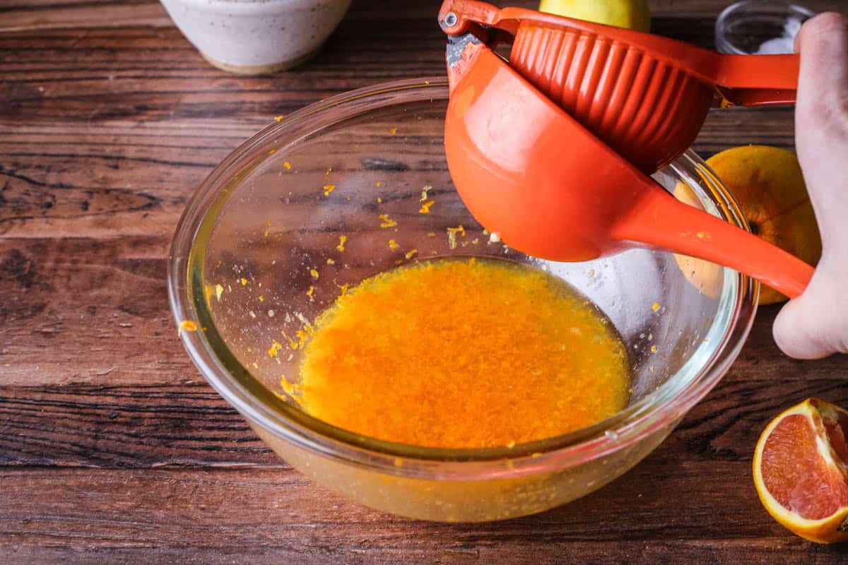 Mexican elbow squeezing orange juice.