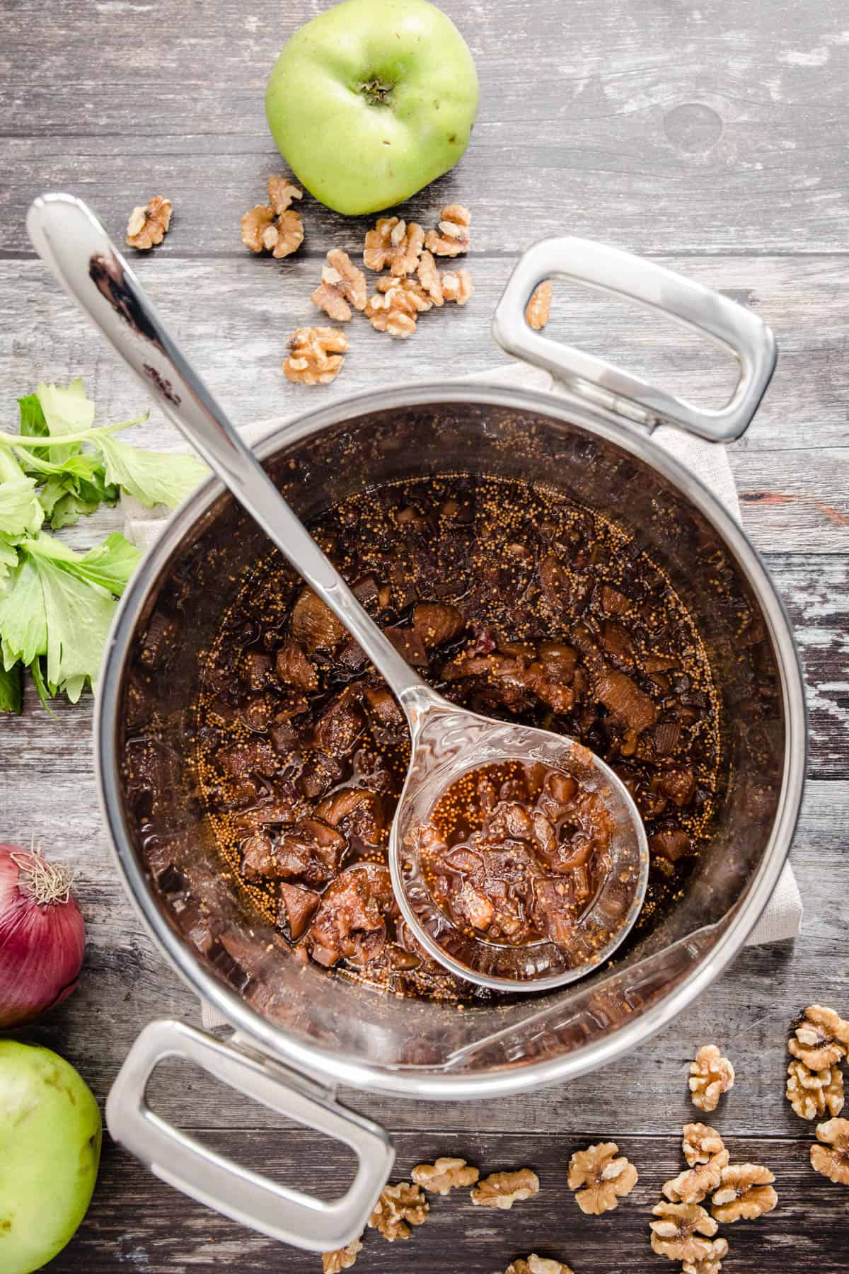 ladle scooping out chutney.