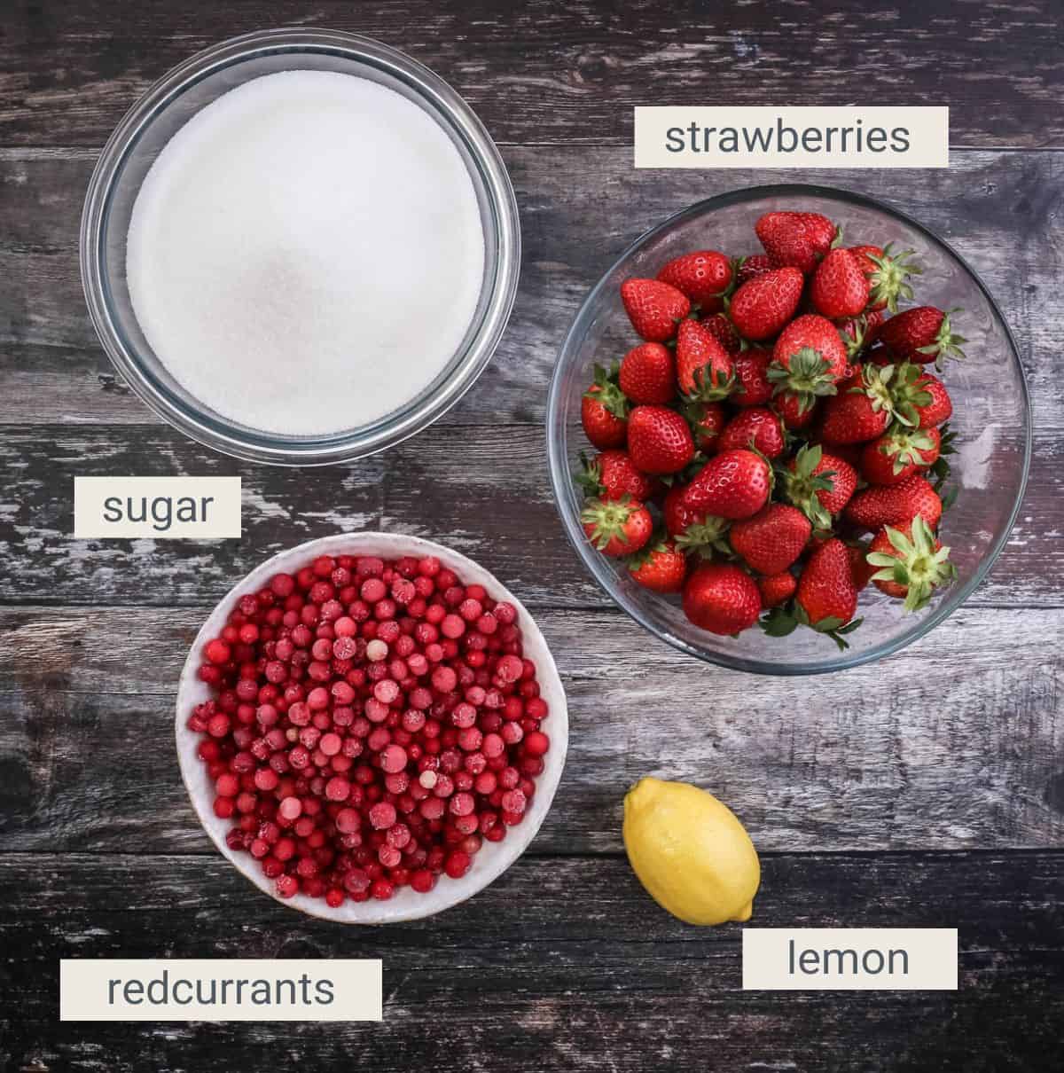 Strawberry Redcurrant Jam ingredients on a table.