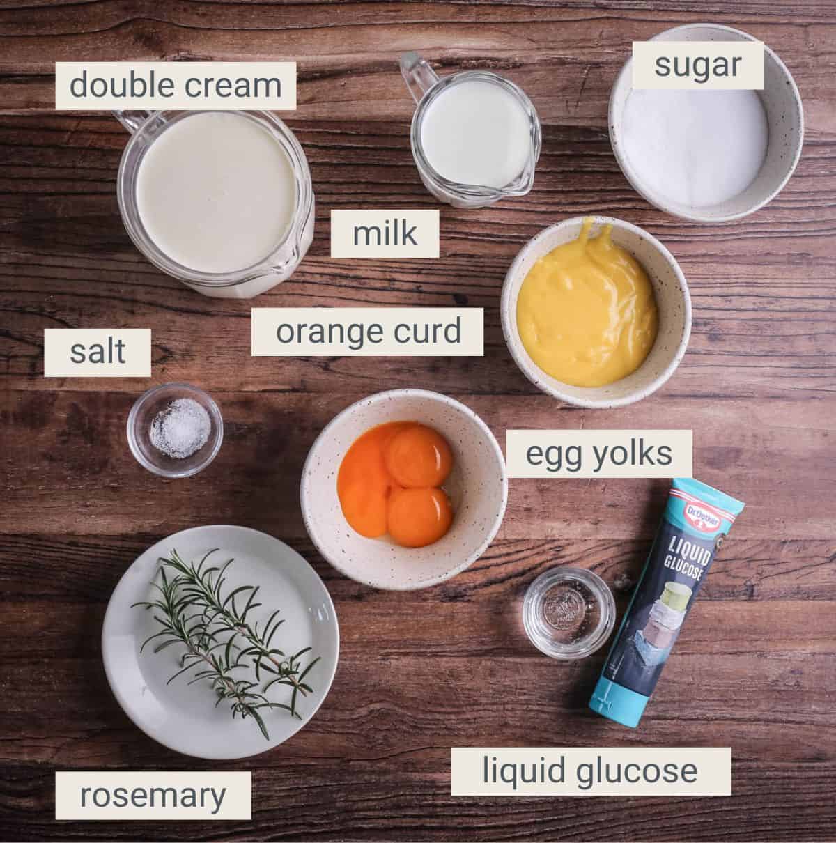 Orange Ice Cream with Rosemary Ingredients on table.