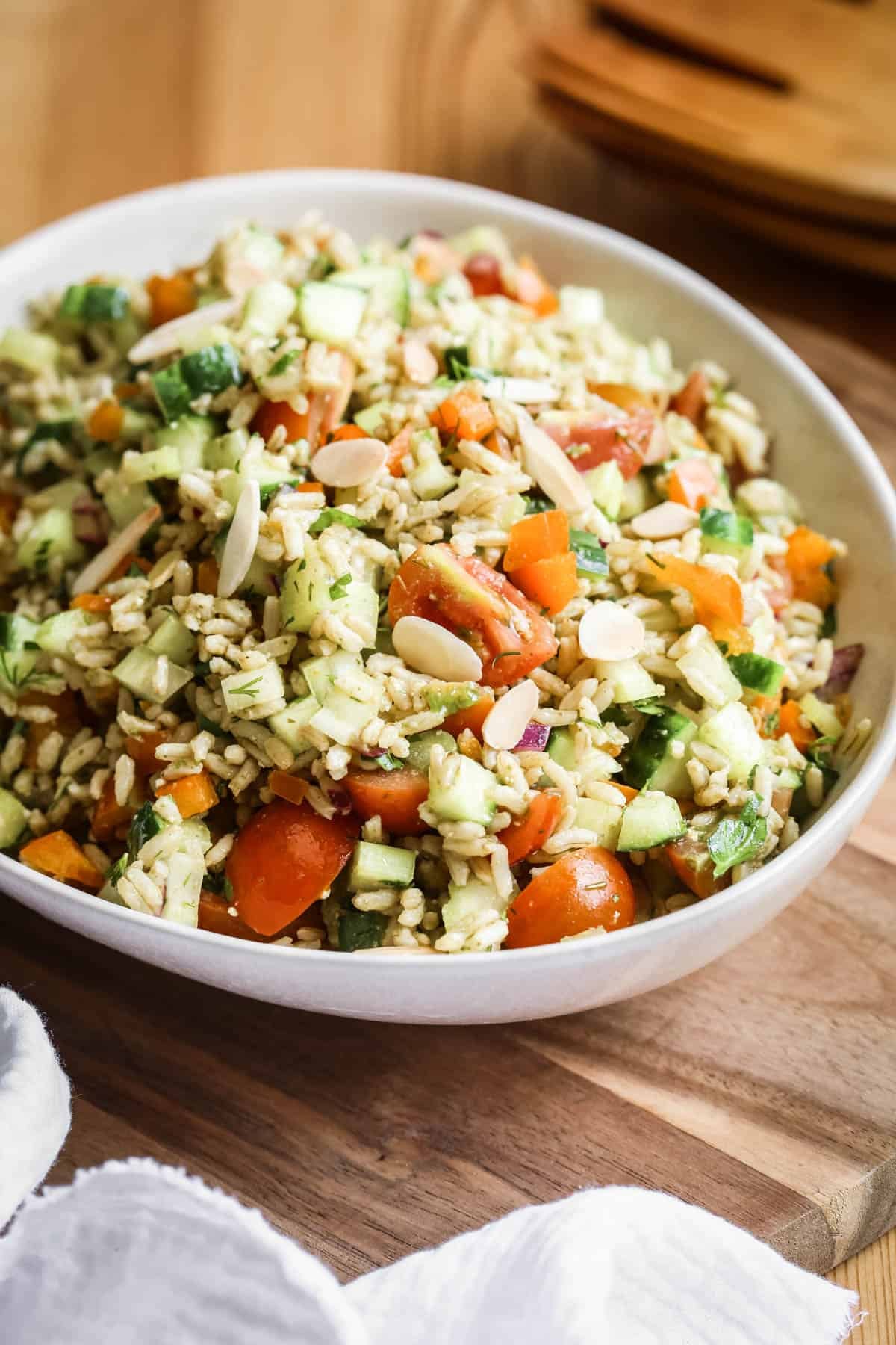 Bowl of Brown Rice Salad with Pesto Dressing.
