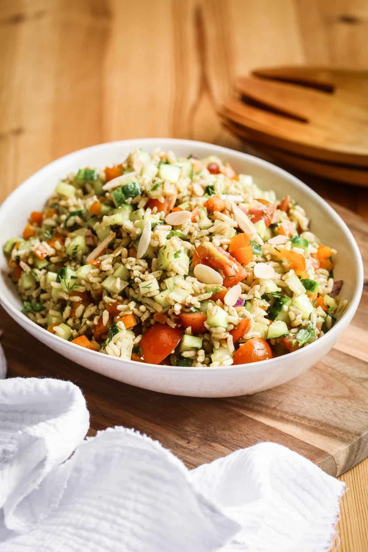 Bowl of Brown Rice Salad with Pesto Dressing.