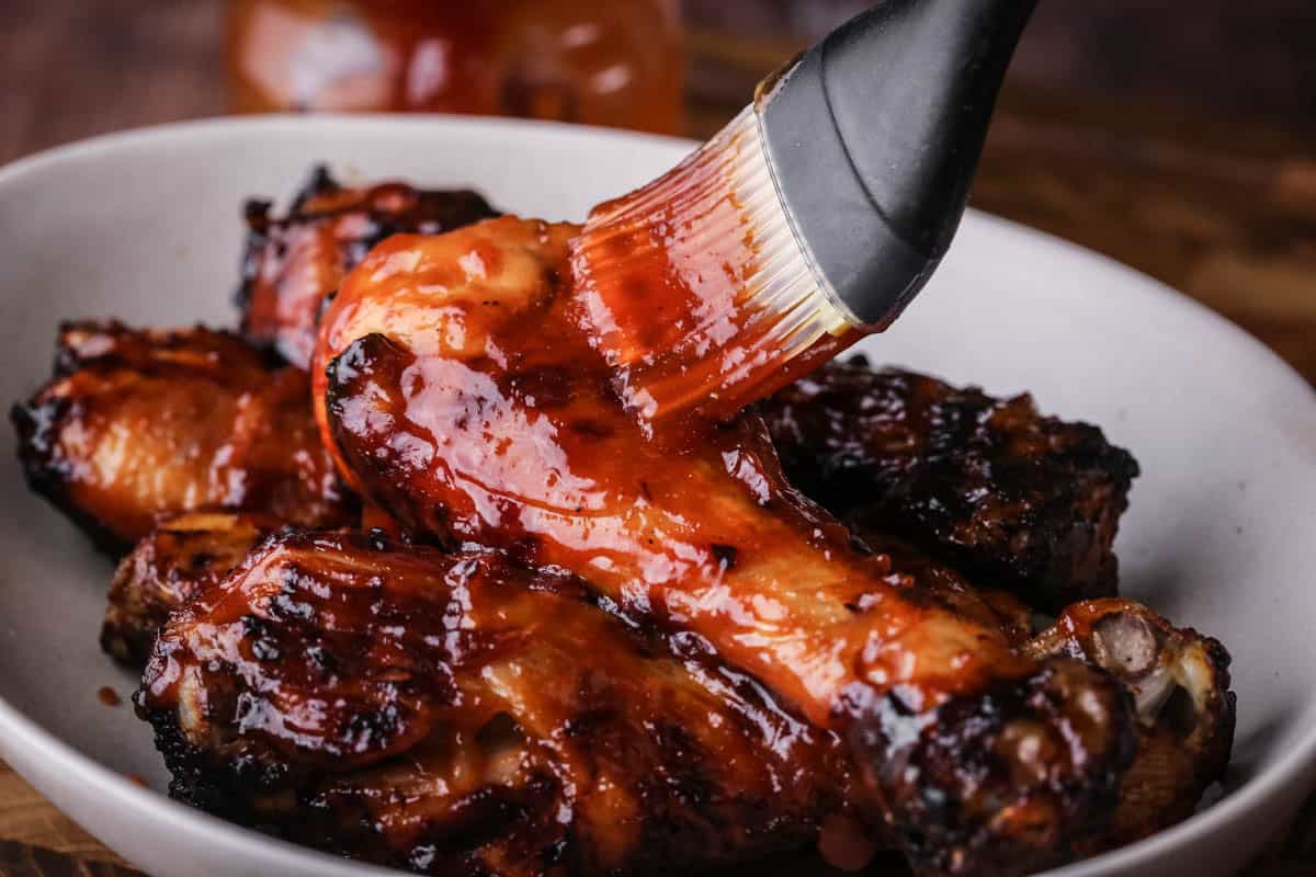Chicken drumsticks cooked and brushed with BBQ Sauce.