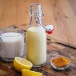 Tahini dressing in a clip top bottle.