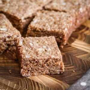 Gluten Free Flapjack on a wooden board showing perfect none crumbly texture.