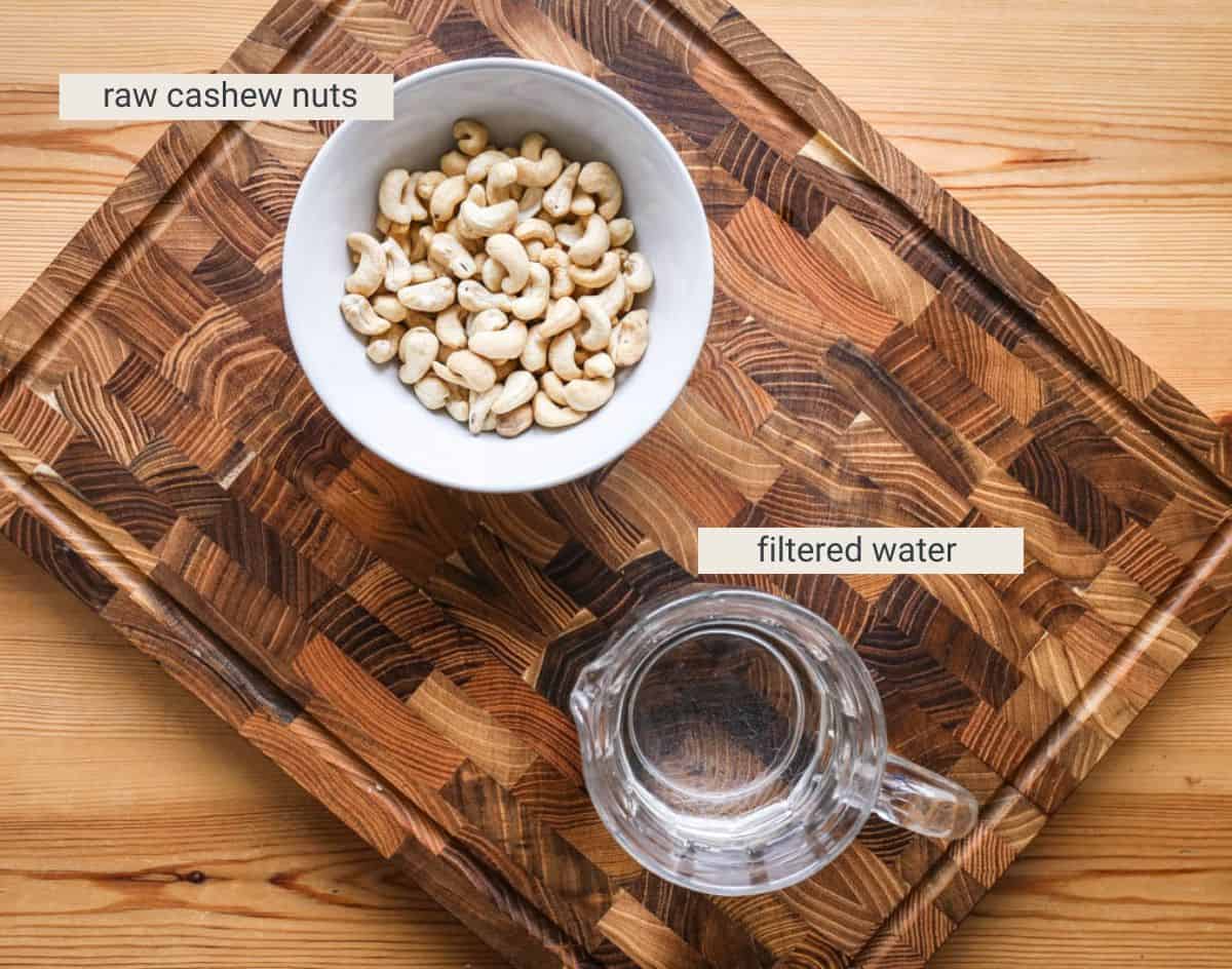 Cashew Milk ingredients on a wooden board.