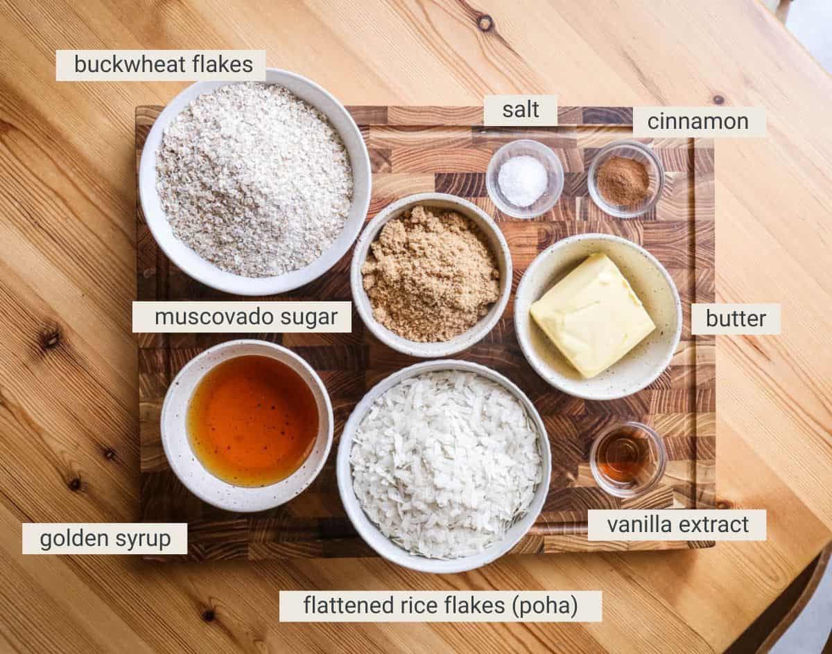 Flapjacks ingredients on a board on a table.