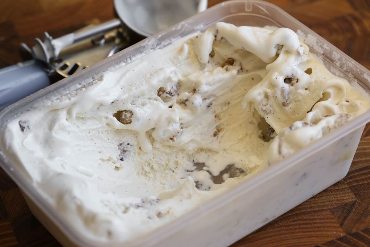 Vegan Banana Bread Ice Cream in ice cream container showing gorgeously creamy texture.