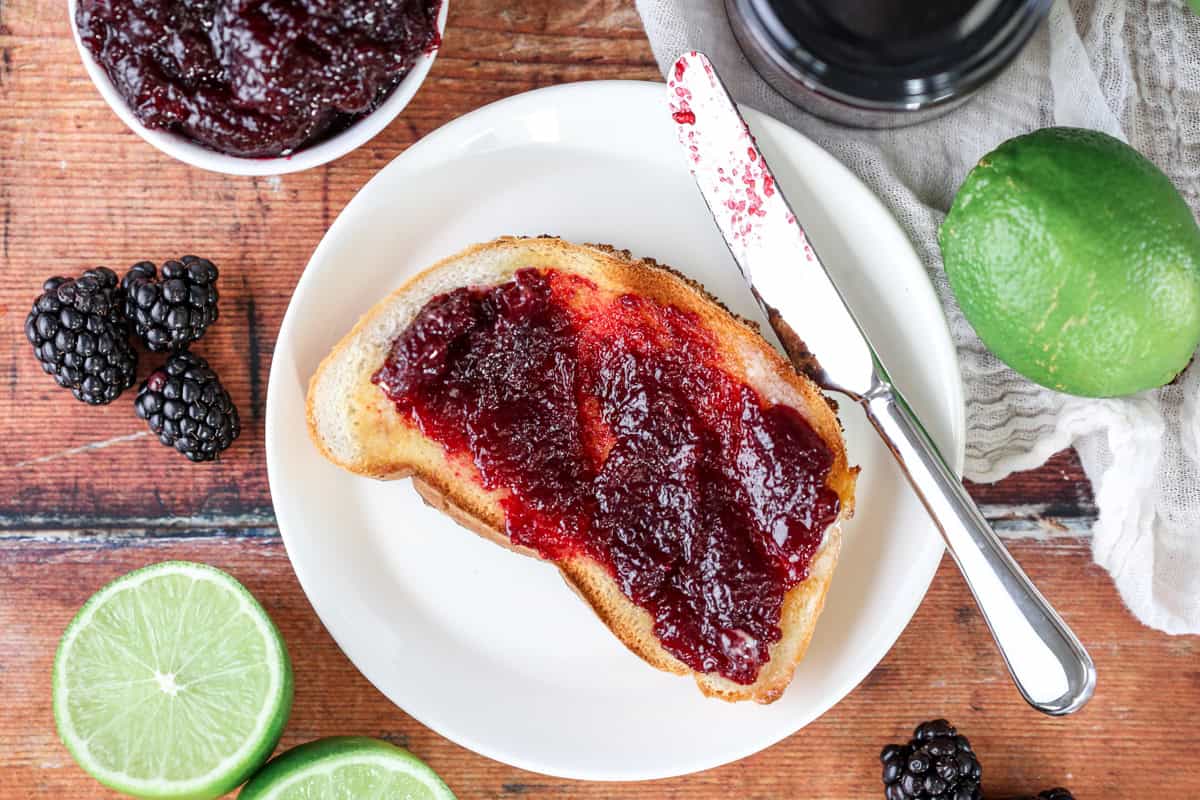 Blackberry Lime Jam spread onto toast.