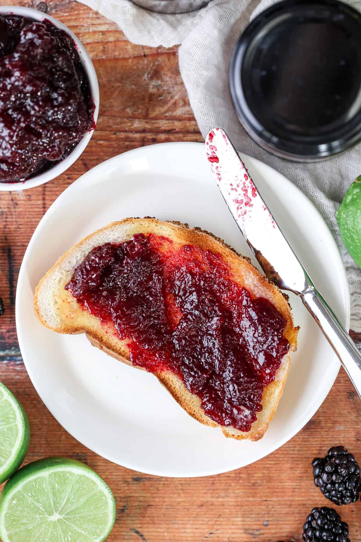 Blackberry Lime Jam spread onto toast.