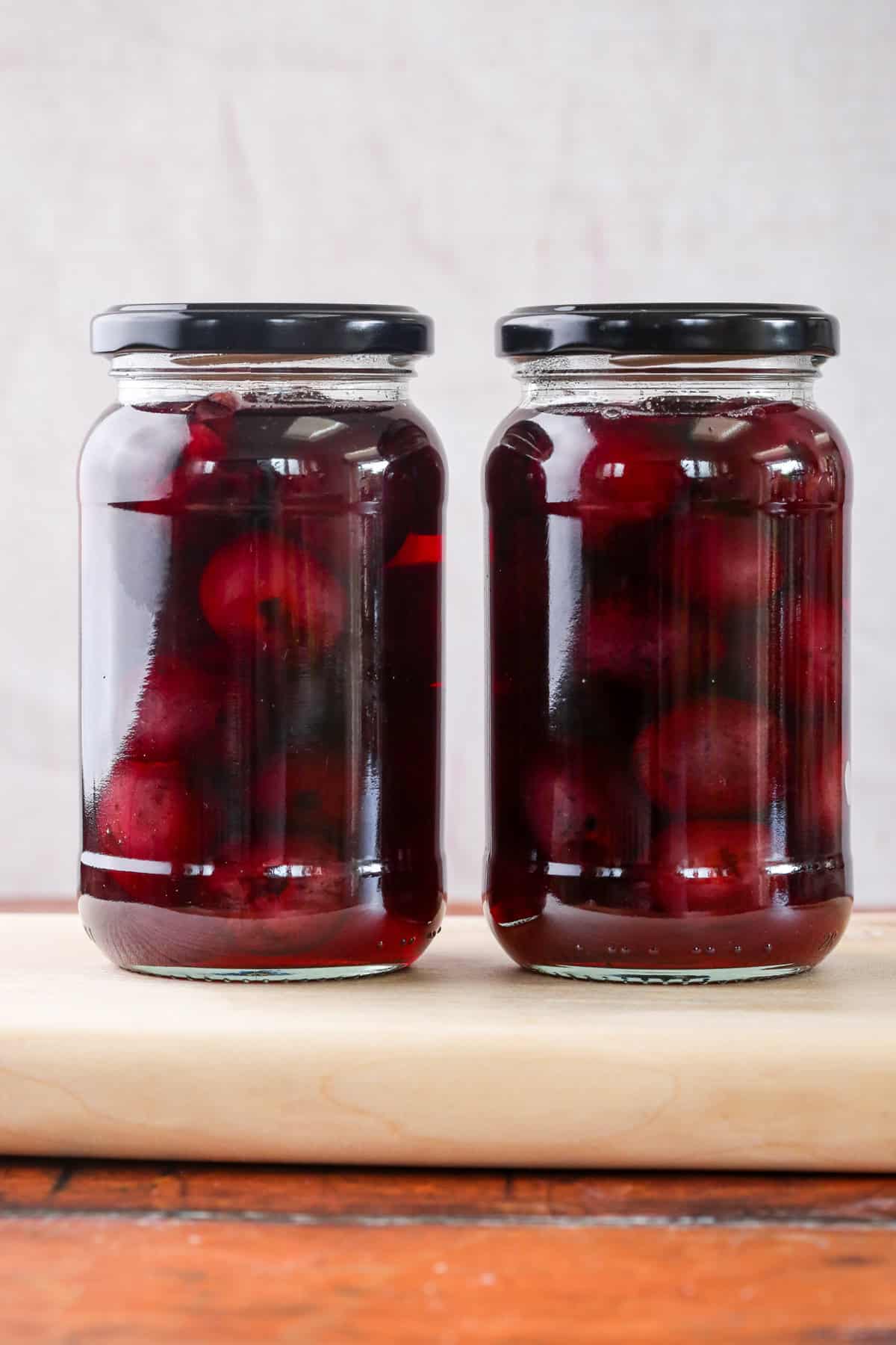 Kirsch Soaked Cherries sealed into sterilised jars.