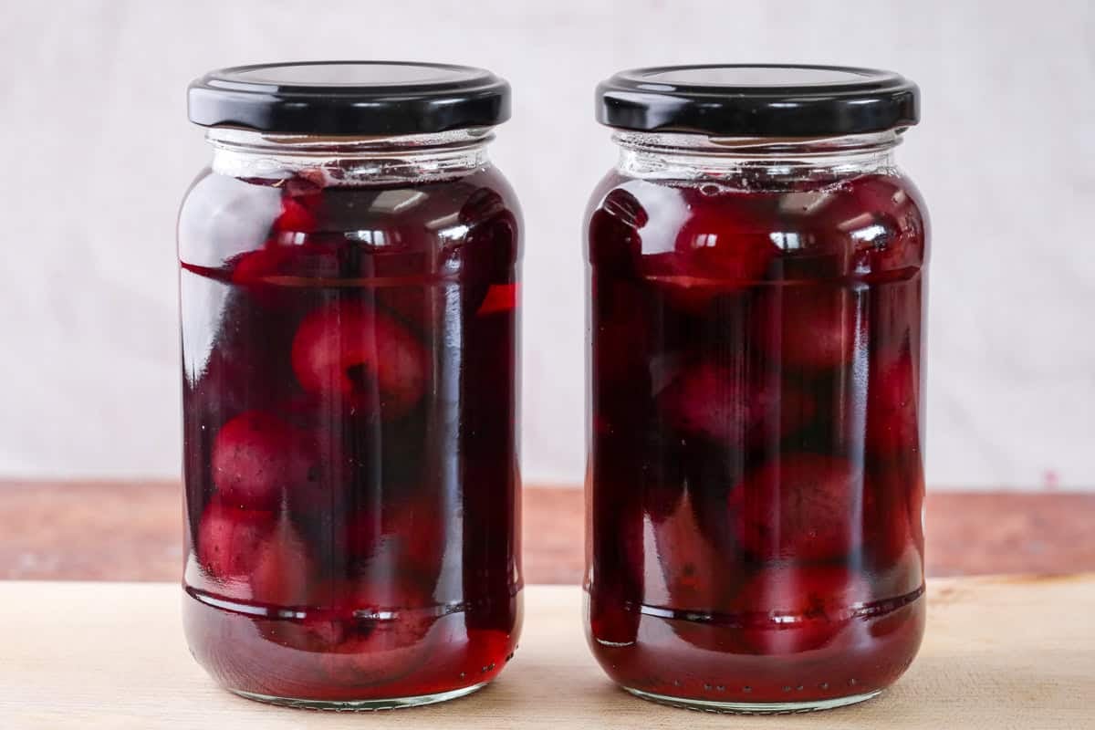 Kirsch Soaked Cherries sealed into sterilised jars.