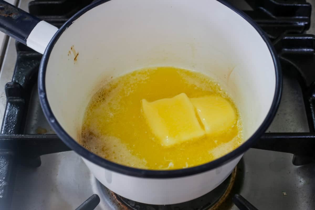 Butter melting in pan.