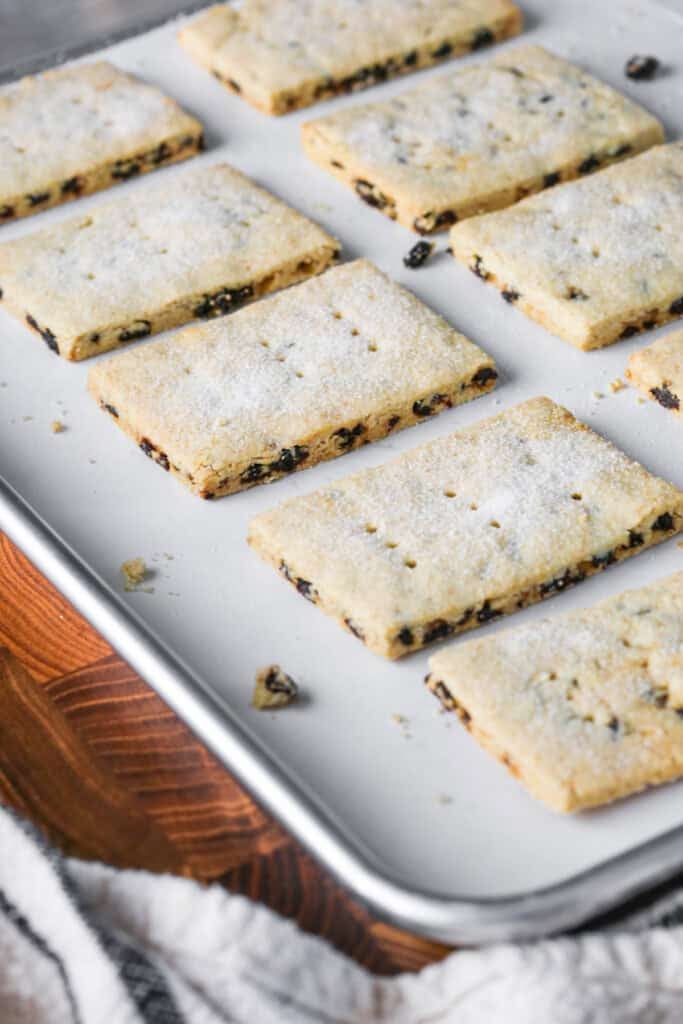 Gluten Free Garibaldi Biscuits on baking tray cooling.